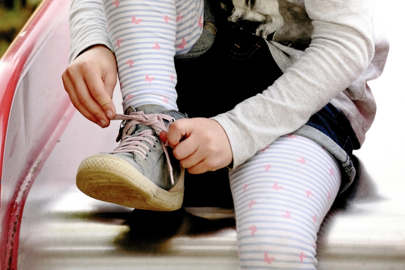 Schnürsenkel binden